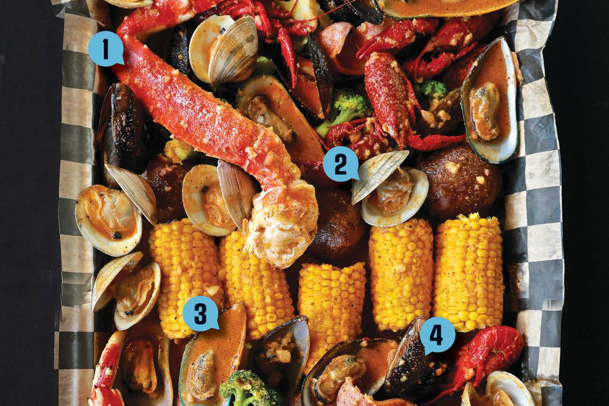The Proper Way to Dig Into a Seafood Boil at Captain Crab